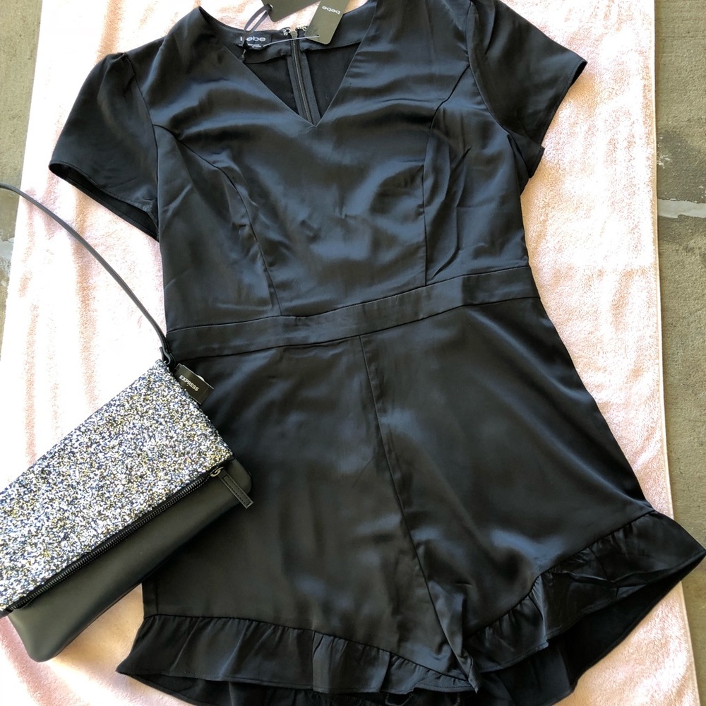 Bebe Romper shorts in size 14! New with tags!